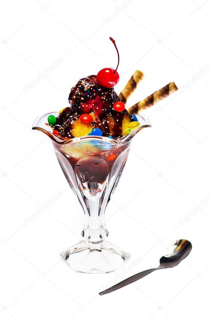 Delicious ice cream sundae with one red cherry