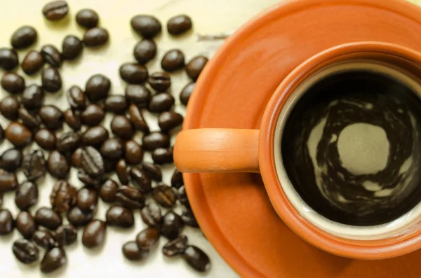 Coffee cup and coffee beans — Stock Photo, Image