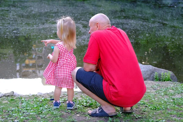 Small Child Year Old Blonde Girl Red Dress Old Man — Stock Photo, Image
