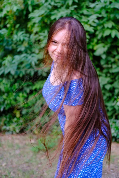 Happy Young Woman Long Hair Blue Dress Having Fun Park — ストック写真