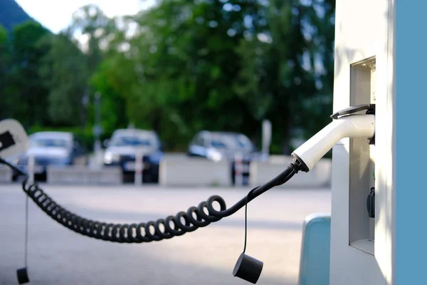 close-up of part of white charging station, replenish battery charging station, alternative energy development concept, electric vehicle production, global business, electric energy storage