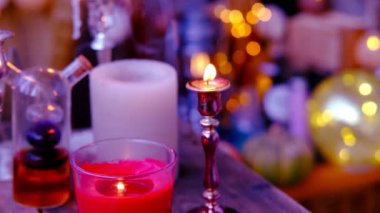andle lights in dark room of future fortuneteller, esoteric Oracle, session of magic, divination for the future, activity at halloween party, prophecies from the world of spirits