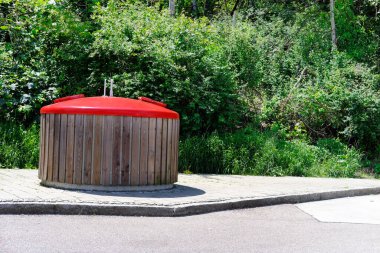 large wooden garbage container, trash can in France, garbage collection in designated place, environmental concept, different types of garbage into different bins, waste recycling