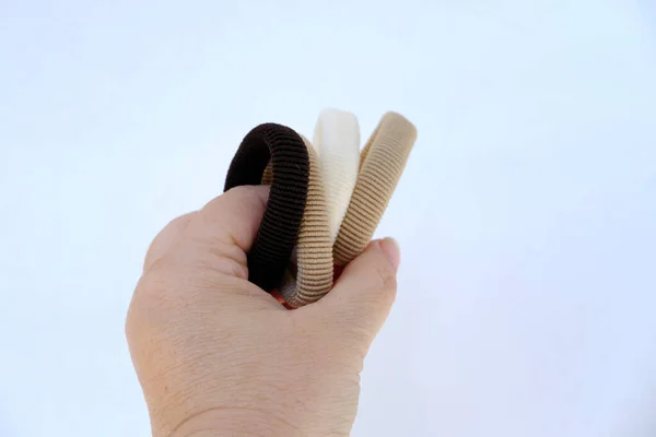 Beautiful White Beige Brown Elastic Hairband Scrunchie Female Hand White — Stock Fotó
