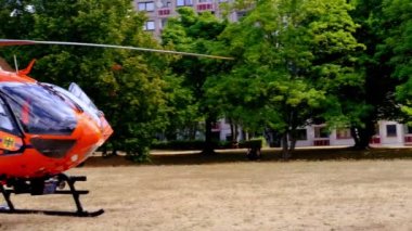 modern Red paramedic ambulance emergency aircraft Germany on helipad, medical helicopter, Air medical services, Rapid Response Vehicles, intensive care on board, Frankfurt, Germany - September 2022