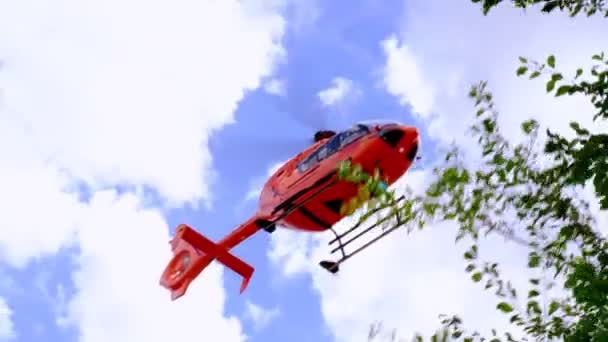 Modern Red Paramedic Ambulance Emergency Aircraft Germany Helipad Medical Helicopter — стоковое видео