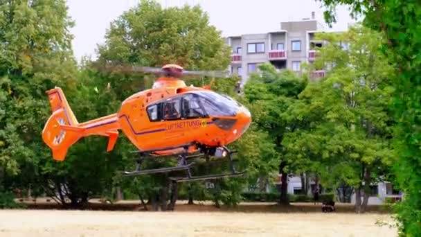 Modern Red Paramedic Ambulance Emergency Aircraft Germany Helipad Medical Helicopter — Vídeos de Stock