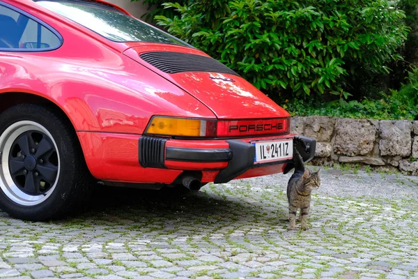 Red Porsche Car Parked House Historic District Old European City — Zdjęcie stockowe