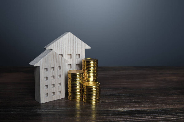 Apartment buildings and money coins. Profit from investment in real estate. Maintenance and repair. Payment of taxes. Rental business. Property valuation. Savings on utilities bills.
