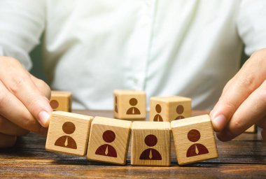 Leader and weak unstable team. Working with human resources. Hiring and recruiting. Recruitment of an effective team. Retraining before being assigned to a new project. Relocation to a new place