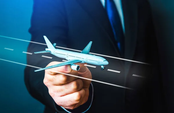 Businessman launches the plane into flight. Business and transport, air communication. Opening new airports, increasing accessibility, improving conditions for local business. Tourism travel.