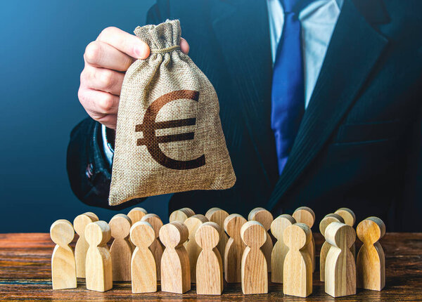 Businessman holds out a euro money bag to the crowd. Compensation payments. Official. Staff maintenance. Financial support. Tax collection. Providing money, paying salaries and grants.