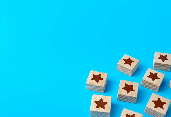 Scattered star blocks on a blue background. Feedback. Inspection, review. Benefits, positive things. New features. Ratings and reviews. Parties and celebrate events.