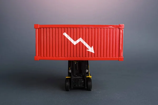 Red shipping container with down arrow. Decrease in imports and exports of goods. Trade traffic decreasing. Production fall. Lowering transportation prices. Decline in profits. Low shipping rates.
