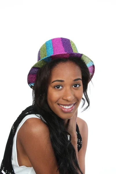 Friendly black woman in a party hat. — Stock Photo, Image
