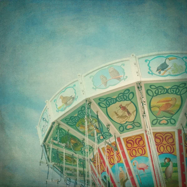 Closeup of a colorful carousel with textured editing — Stock Photo, Image