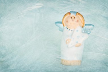 Şirin mavi renkli melek dokulu arka plan üzerinde