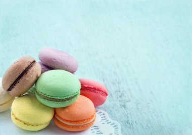 Macaroons on blue textured shabby chic background