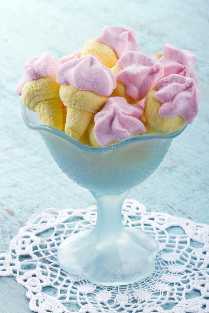 Ice cream shaped marshmallows in a blue bowl