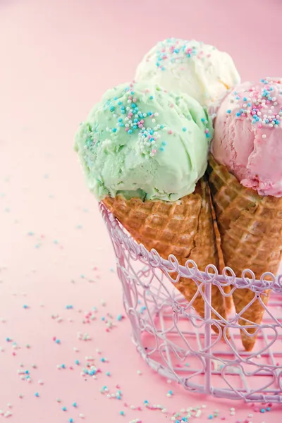 Cones of ice cream on pink background — Stock Photo, Image