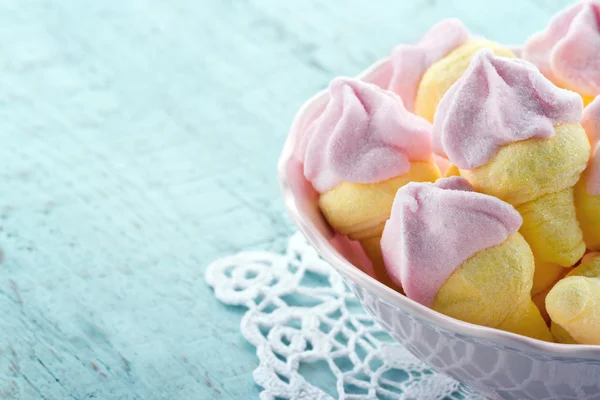 Pink ice cream shaped marshmallows on wooden background — Stock Photo, Image