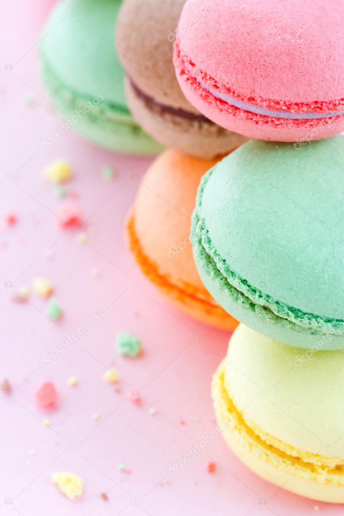 Colorful macaroons on pastel pink background — Stock Photo © anskuw ...