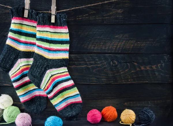 Pair of colorful striped woolen socks — Stock Photo, Image