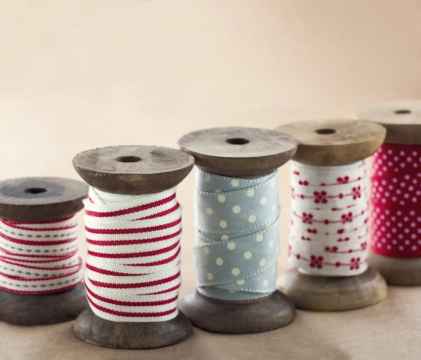 Wooden ribbon spools — Stock Photo, Image