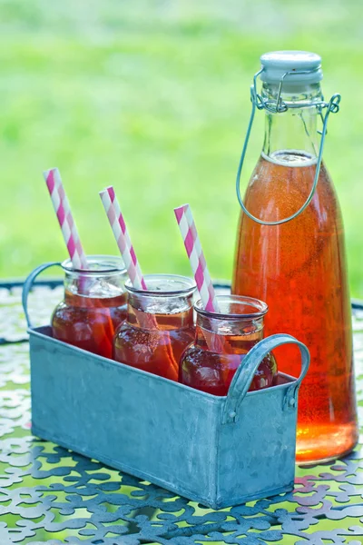 Glasses of red strawberry juice — Stock Photo, Image