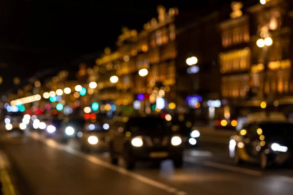 Defocus view of the landscape of the night city. Traffic jam on of the car and the lighting of the city in bokeh — Stock Photo, Image