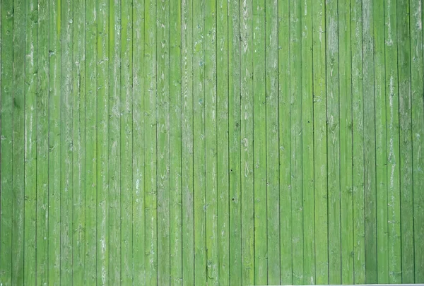 Eski yeşil boyanmış tahtaların yeşil ahşap arka planı. — Stok fotoğraf