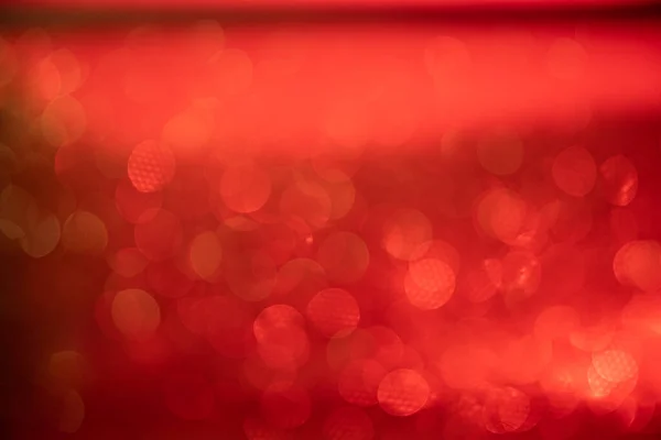 Red with gold festive background. Bokeh from light . Futuristic glittering in space. — 图库照片