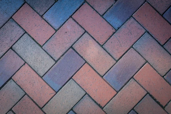 Precioso fondo de losa de pavimentación multicolor. Vista desde arriba. Ladrillos multicolores y adoquines. — Foto de Stock