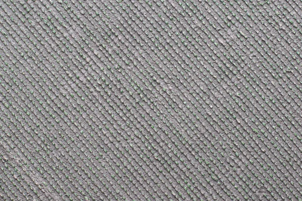 Текстурована поверхня гумового мату з швами — стокове фото