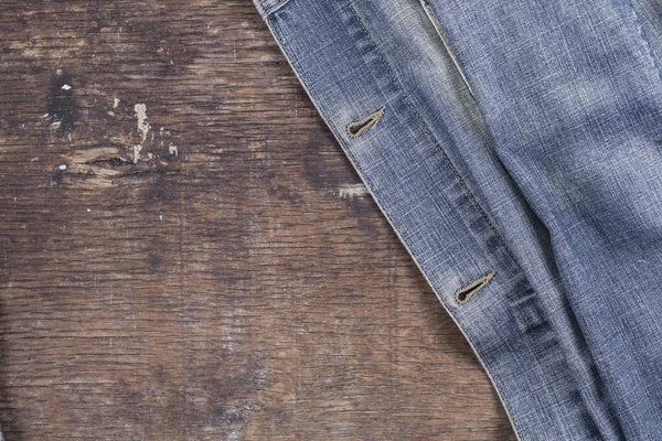 Blue Denim Jacket Brown Wooden Table View — Stok fotoğraf