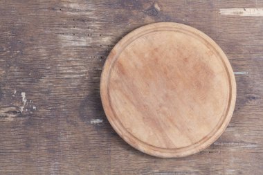 Yuvarlak mutfak kesme tahtası. Renkli yakın plan.