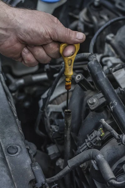 Changing the oil in the car, the process of checking the oil in the engine of the car