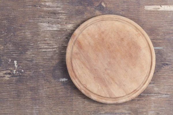 Yuvarlak mutfak kesme tahtası. Renkli yakın plan.