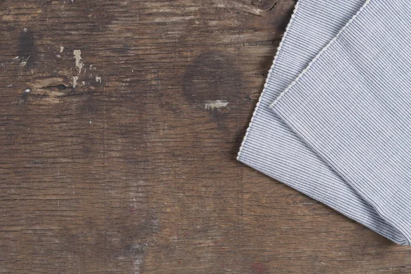 褐色背景图上的厨房毛巾 — 图库照片