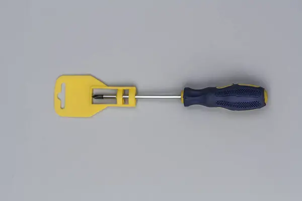 Repair Phillips Screwdriver Blue Handle Close Gray Background Top View — Stok fotoğraf
