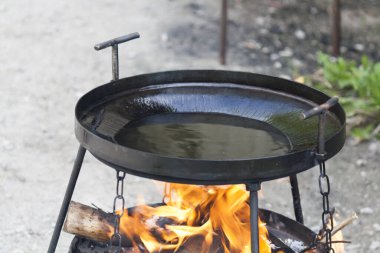 Black grill for cooking on a fire on the street