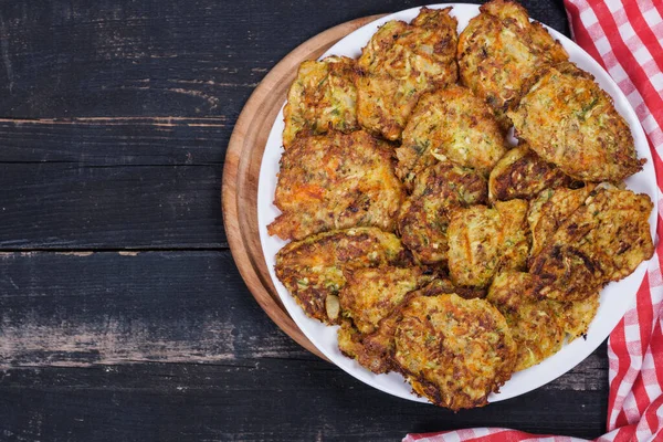 Vegetarian fried zucchini pancakes, healthy food, vegan food