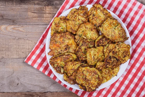 Vegetarian fried zucchini pancakes, healthy food, vegan food