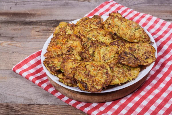 Vegetarian fried zucchini pancakes, healthy food, vegan food