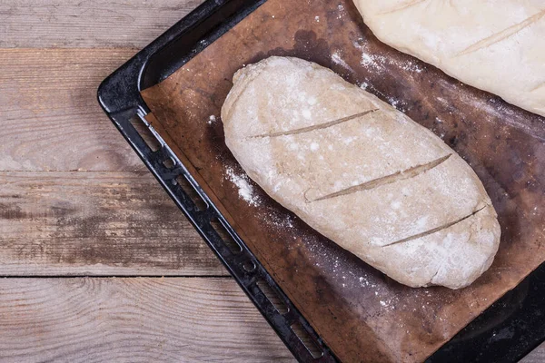 Home baking, cooking homemade bread at home, home baking in the oven close-up