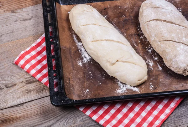 Home baking, cooking homemade bread at home, home baking in the oven close-up