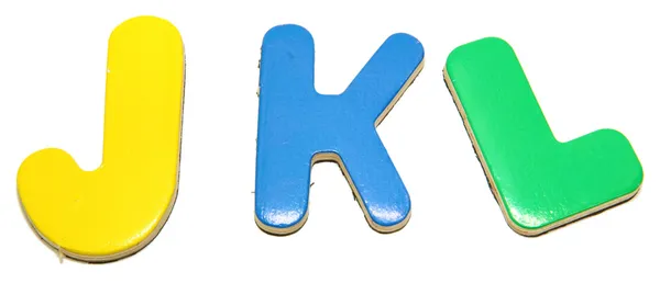 Красочные магнитные буквы J K L — стоковое фото