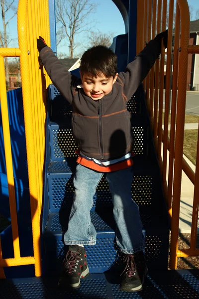 Boy playing at park — Stock Photo, Image