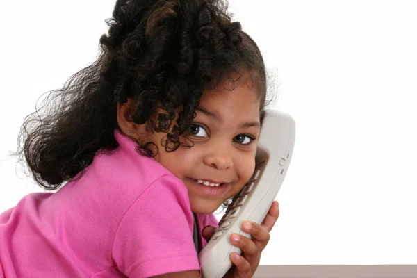 Krásná holčička na telefonu — Stock fotografie