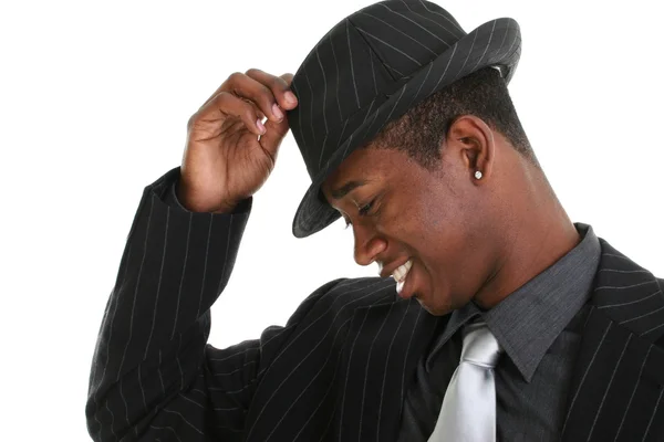 Jovem atraente derrubando seu chapéu — Fotografia de Stock